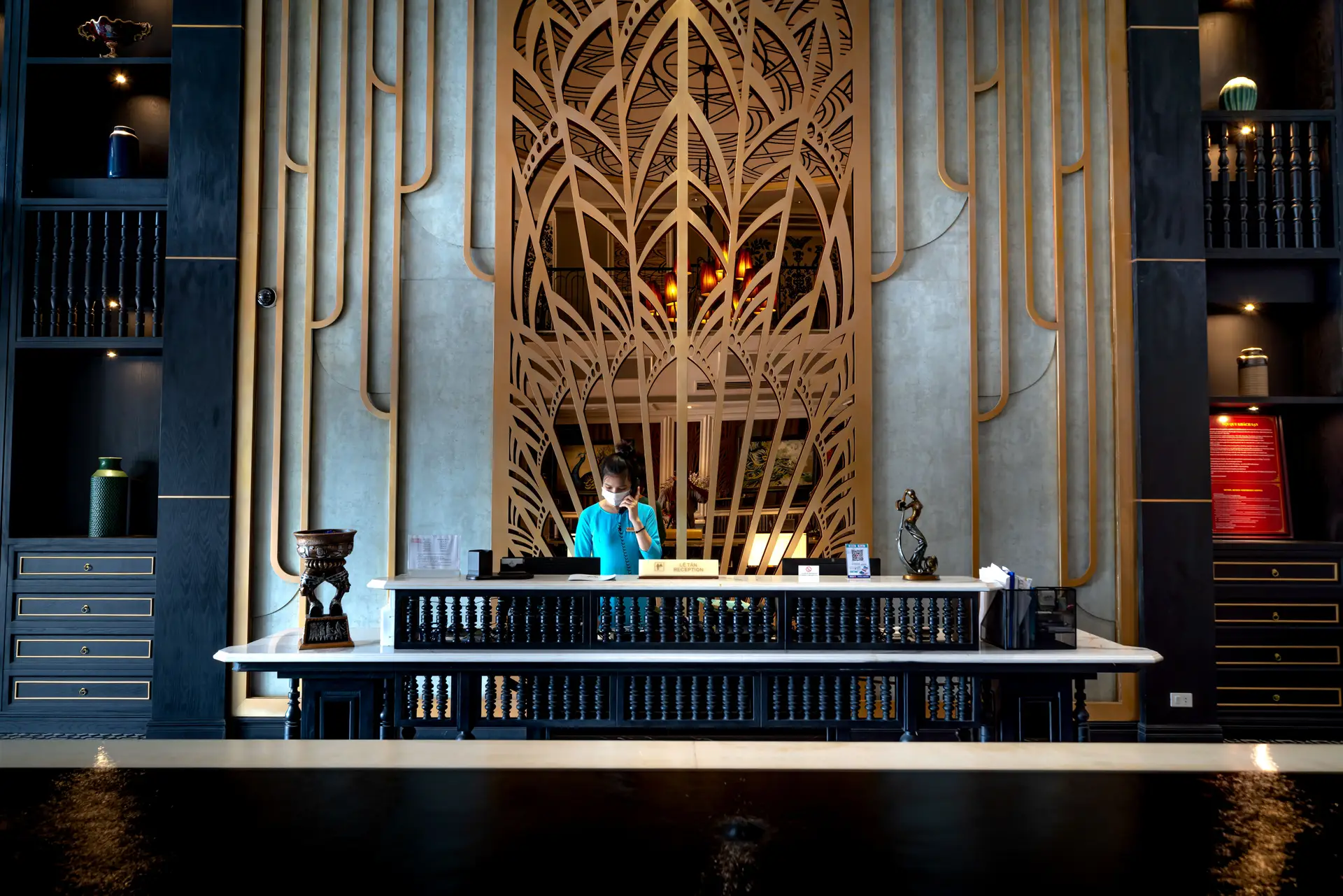 Luxurious LaviraHotelSuites lobby with gold accents