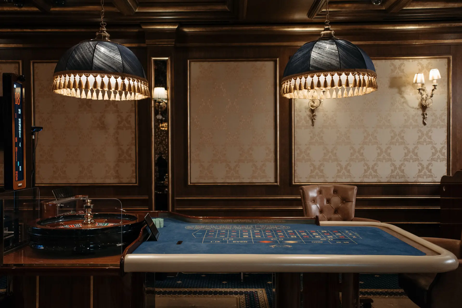Sophisticated casino interior featuring a traditional roulette table at LaviraHotelSuites